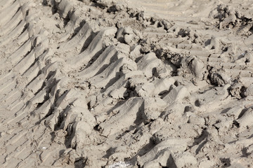 Traces of tires on a dirt road