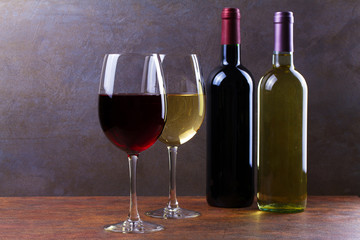 Glasses and bottles of red and white wine