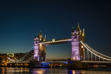 Fototapeta na wymiar Tower bridge just before dawn, sunrise crossing the river Thames on a clear night in London, England, UK, Europe