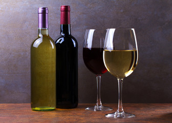 Glasses and bottles of red and white wine