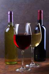 Glasses and bottles of red and white wine