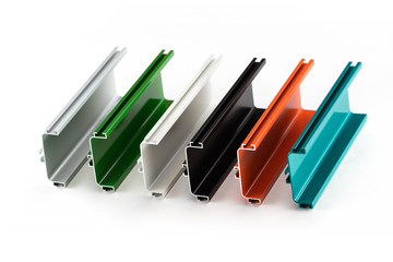 Samples of colorful aluminum profiles over white background