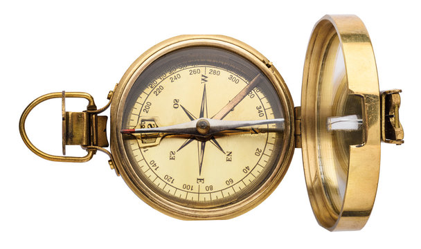 Vintage brass compass isolated on white background - Stock