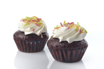 Front View of Chocolate Cupcakes On White Background