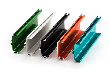 Samples of colorful aluminum profiles over white background