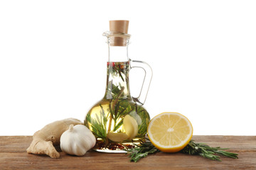 Olive oil with spices, isolated on white