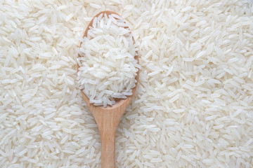 Jasmine rice and wooden spoon