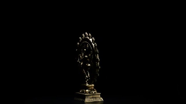Shiva, deity of buddhism religion, rotating with smoke on black background