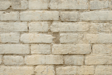 Fototapeta premium Brick texture with scratches and cracks