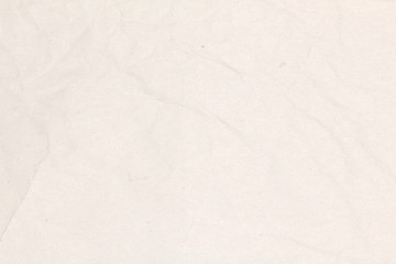 Recycled crumpled light brown paper texture or paper background for design with copy space for text or image.