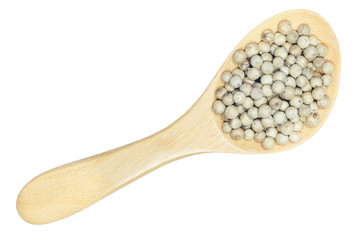 White peppercorn in wooden spoon isolated on white background with clipping path.