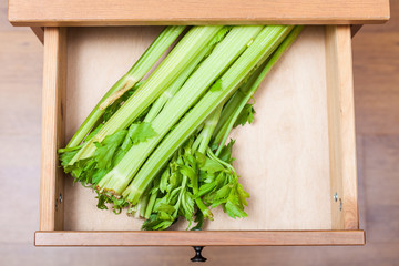 celery stalks in open drawer