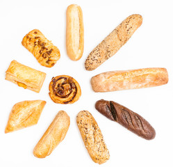 various freshly baked buns and loaves in sun shape