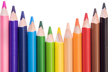 Colored pencils on white background