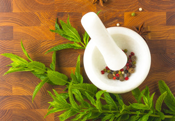 Fresh spearmint herb in the mortar