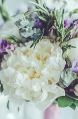 Beautiful tender white peony flower with rosemary, aroma lavender, roses bunch. Provencal herbs. Rustic style. Bridal symbol, pastel colors. Selective soft focus.