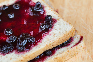 sliced bread and Blueberry jam