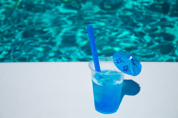 old coctail on the pool background