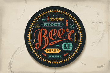 Coaster for beer with hand drawn lettering. Colorful vintage drawing for bar, pub and beer themes. For placing a beer mug or a beer bottle over it with lettering for beer theme. Vector Illustration