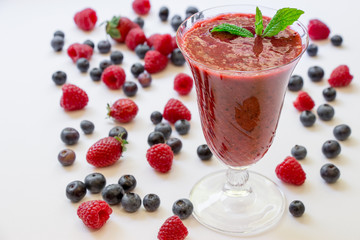 Strawberry raspberry blueberry smoothies.