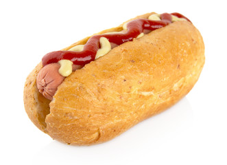 Hot dog with mustard and ketchup isolated on white