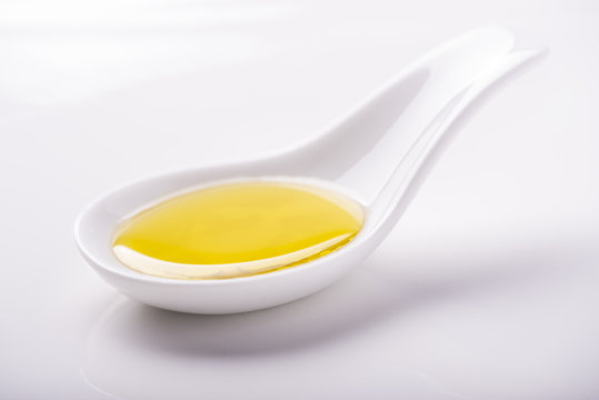 Virgin Olive Oil In A Porcelain Spoon