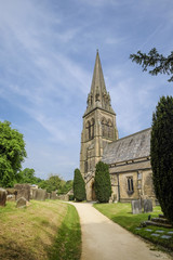 Fototapeta na wymiar Pretty village church (St Peter's Parish Church at Edensor in the UK)