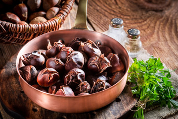 Hot chestnuts with garlic sauce