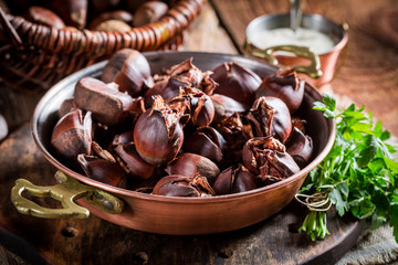 Closeup of homemade chestnuts with parsley
