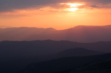 Red sunset in mountains