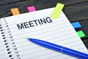 Meeting word on notepad