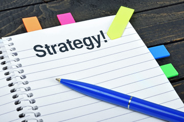 Strategy word on notepad