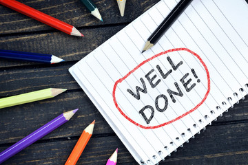Well Done text on notepad