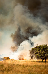 Fototapeta na wymiar Firefighters fighting fire.