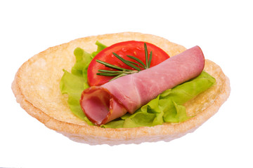 Sandwich with sausage and tomato