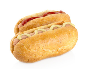 Hot dog with mustard and ketchup on white