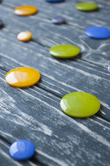 Obraz na płótnie Canvas A set of colorful glass buttons for clothes 