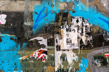 background texture of torn placards