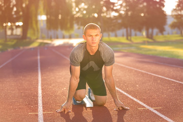Obraz premium Track runner in starting position