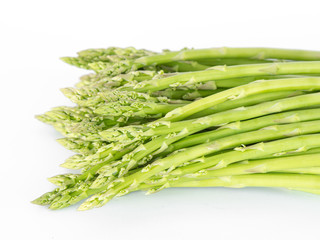 Fototapeta premium Fresh asparagus, isolated on white background. 