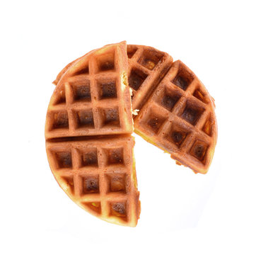 Round ruddy waffle isolated on white background