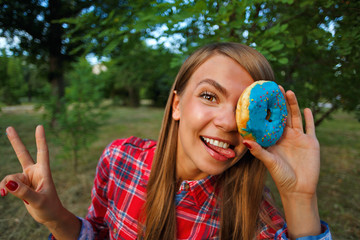 Merry girl and a donut