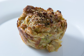 Zucchini muffin in white plate