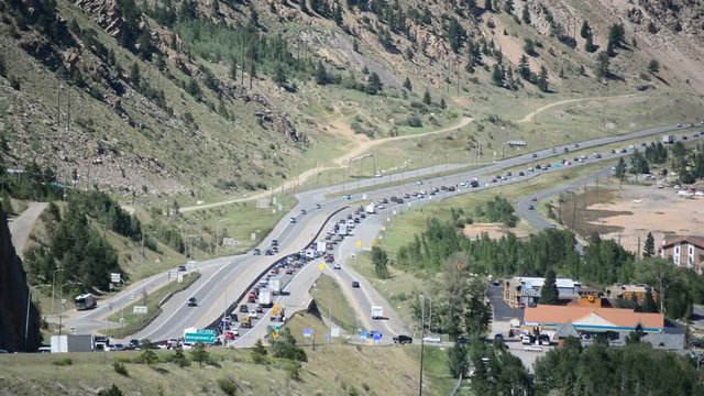 Slow Moving Traffic Jam Merging onto Interstate 70 in the Colorado Rocky Mountains 