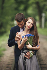 Loving Couple. Boy and girl walking in the beautiful park