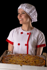 smiling girl chef with pizza in hands