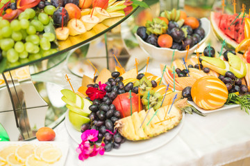 Authentic buffet, assorted fresh fruits, berries and citrus. Preparation for design creative menu