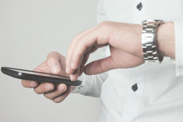 Phone in the businessman hand