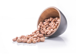 peeled peanuts a cup, isolated,