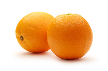 Two fresh oranges on white background